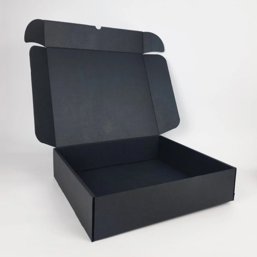 Black Corrugated Box – 29.7L x 33.5W x 8H cm — Black Corrugated Box – 29.7L x 33.5W x 8H cm — ready-made or custom-branded with your logo, delivered across Dubai & the UAE.